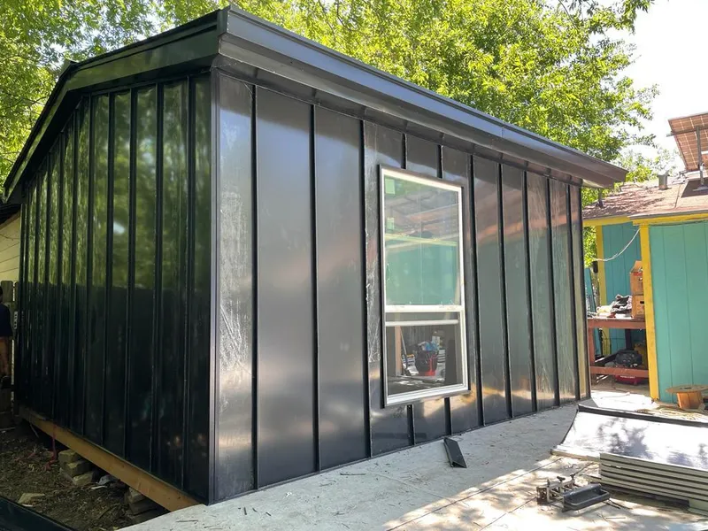 Black standing seam metal wall panels for Metal Roof Installation in Dundee