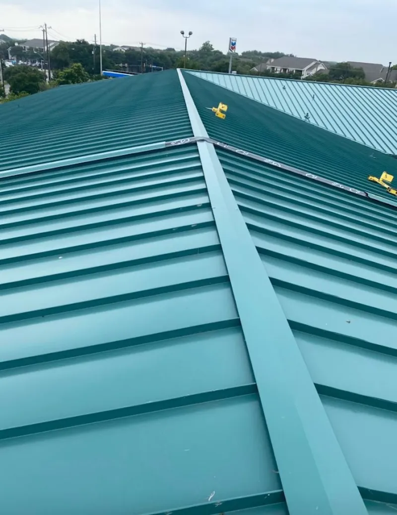 Green commercial metal roof ridge and valley for Metal Roof Repair in Dundee